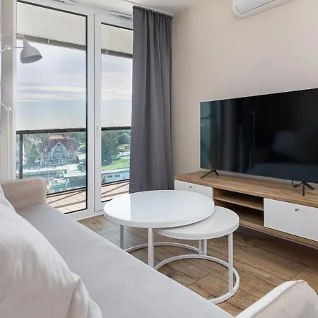 Lighthouse, Sun & Snow מיצ'יצ'ניו